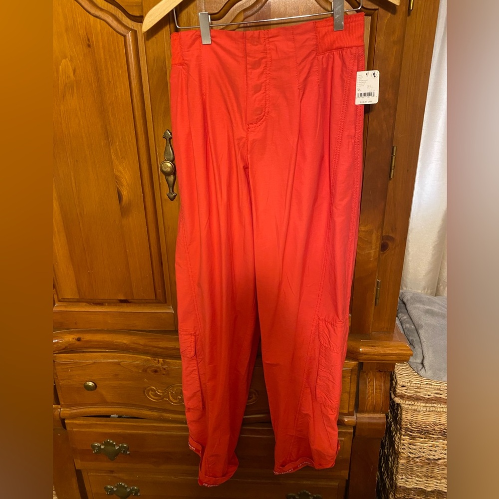 Free people Womens mesmerize me orange cargo pants  new with tags